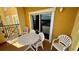 Balcony with table and chairs, great for outdoor dining at 8101 Resort Village Dr, Orlando, FL 32821