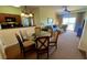 Open dining area with kitchen and living room view at 8101 Resort Village Dr, Orlando, FL 32821