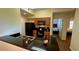 Fully equipped kitchen with black appliances at 8101 Resort Village Dr, Orlando, FL 32821