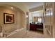 Main bathroom with a large bathtub, double vanity, and a shower at 8101 Resort Village Dr, Orlando, FL 32821