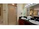 Double vanity bathroom with a shower and bathtub at 8101 Resort Village Dr, Orlando, FL 32821