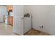 Laundry area with washer and dryer, conveniently located near kitchen at 117 Verbena St, Davenport, FL 33837