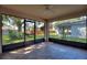 Screened patio with tiled floor, providing outdoor living space at 117 Verbena St, Davenport, FL 33837