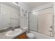 Clean bathroom with a tub, shower, and vanity with a granite countertop at 117 Verbena St, Davenport, FL 33837