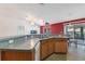 Kitchen features a large island and wood cabinets at 117 Verbena St, Davenport, FL 33837