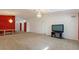 Open living area with a view into the dining room and kitchen at 117 Verbena St, Davenport, FL 33837