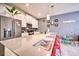 Modern kitchen with large island and stainless steel appliances at 8988 Stinger Dr, Champions Gate, FL 33896