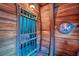Themed nautical bathroom with a jail cell door at 8988 Stinger Dr, Champions Gate, FL 33896