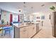 Open concept kitchen with white cabinets and granite countertops at 8988 Stinger Dr, Champions Gate, FL 33896