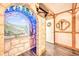 Fairytale-themed bedroom with stone wall accents and a magical mural at 8988 Stinger Dr, Champions Gate, FL 33896