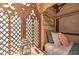 Bedroom featuring a stained glass window and cozy decor at 8988 Stinger Dr, Champions Gate, FL 33896