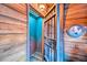 Nautical-themed bathroom with porthole and jail cell door at 8988 Stinger Dr, Champions Gate, FL 33896