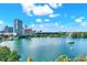 Panoramic view of the lake, featuring a fountain and city skyline at 322 E Central Blvd # 901, Orlando, FL 32801