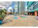 Relaxing rooftop pool and spa with lounge seating at 322 E Central Blvd # 901, Orlando, FL 32801