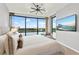 Main bedroom with a king-size bed and stunning lake views at 322 E Central Blvd # 901, Orlando, FL 32801