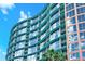 Modern building exterior with teal accents at 322 E Central Blvd # 901, Orlando, FL 32801