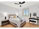 Main bedroom with ceiling fan and ensuite bathroom at 322 E Central Blvd # 901, Orlando, FL 32801
