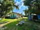 Large backyard with mature trees at 1610 Crest Ave, Leesburg, FL 34748