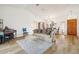 Bright living room with hardwood floors and comfy seating at 1546 Thornhill Cir, Oviedo, FL 32765