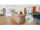 Living room with hardwood floors and view of kitchen at 1546 Thornhill Cir, Oviedo, FL 32765