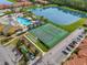 Aerial view of community pool and sports courts at 8947 Bismarck Palm Rd, Kissimmee, FL 34747