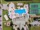 Aerial view of community pool, tennis, and basketball courts at 8947 Bismarck Palm Rd, Kissimmee, FL 34747