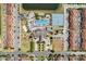 Aerial view showing community amenities and residential buildings at 8947 Bismarck Palm Rd, Kissimmee, FL 34747
