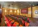 Community theater room with comfortable seating at 8947 Bismarck Palm Rd, Kissimmee, FL 34747