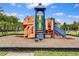 Colorful playground with slides and climbing structures at 8947 Bismarck Palm Rd, Kissimmee, FL 34747