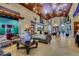 Elegant community clubhouse lobby with comfortable seating and high ceilings at 8947 Bismarck Palm Rd, Kissimmee, FL 34747