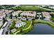 Aerial view of condo community by a lake at 3311 Whitestone Cir # 207, Kissimmee, FL 34741