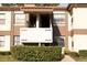 Exterior view of a two-story building with multiple units at 3276 Candle Ridge Ct # 202, Orlando, FL 32822
