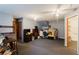 Large bedroom with ceiling fan, dresser, and closet at 3500 Sail Fish Ave, Fruitland Park, FL 34731
