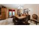 Dining room with a large table, chairs, and a chandelier at 3500 Sail Fish Ave, Fruitland Park, FL 34731