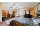 Spacious main bedroom with high ceilings and ensuite bathroom at 3500 Sail Fish Ave, Fruitland Park, FL 34731