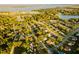 Community overview showcasing neighborhood and lake at 3500 Sail Fish Ave, Fruitland Park, FL 34731