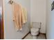 Small bathroom with toilet and wall-mounted towel rack at 3500 Sail Fish Ave, Fruitland Park, FL 34731