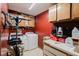 Laundry room with washer, dryer, and extra cabinets at 3500 Sail Fish Ave, Fruitland Park, FL 34731