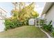 Spacious backyard with shed and greenery at 3500 Sail Fish Ave, Fruitland Park, FL 34731