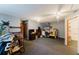 Large bedroom with ceiling fan, dresser, and closet at 3500 Sail Fish Ave, Fruitland Park, FL 34731