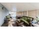 Screened patio with pool view and seating at 3500 Sail Fish Ave, Fruitland Park, FL 34731