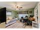 Bright bedroom with desk and day bed at 3500 Sail Fish Ave, Fruitland Park, FL 34731