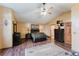 Large bedroom with wood floors and walk-in closet at 3500 Sail Fish Ave, Fruitland Park, FL 34731