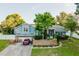 Two-story house with a large yard and driveway at 3500 Sail Fish Ave, Fruitland Park, FL 34731
