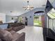 Spacious living room with tile floors and sliding doors at 9920 4Th Ave, Orlando, FL 32824