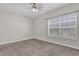 Spacious bedroom with carpeted floor and ceiling fan at 2514 Grand Central Pkwy # 2, Orlando, FL 32839