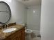 Updated bathroom with granite vanity and bathtub at 4815 S Texas Ave # C, Orlando, FL 32839