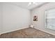 Spacious bedroom with neutral walls, carpet flooring and ceiling fan at 372 Hinsdale Dr, Debary, FL 32713