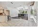 Open concept kitchen with granite countertops and stainless steel appliances at 372 Hinsdale Dr, Debary, FL 32713