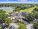 Aerial view of community clubhouse near golf course and lake at 372 Hinsdale Dr, Debary, FL 32713